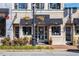 Charming storefront with hanging floral baskets and decorative awnings in a vibrant, walkable neighborhood at 866 Lakemont Dr, Canton, GA 30114
