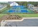 Community tennis courts feature shade pavilion and manicured landscaping at 866 Lakemont Dr, Canton, GA 30114