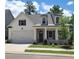 Charming craftsman-style home with a two-car garage and welcoming front porch at 866 Lakemont Dr, Canton, GA 30114