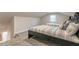 Bright bedroom featuring plush carpeting, comfortable beds, and natural light from the window at 1472 North Nw Ave, Atlanta, GA 30318