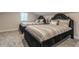Spacious bedroom featuring two beds with decorative headboards, providing a comfortable and stylish living space at 1472 North Nw Ave, Atlanta, GA 30318