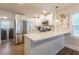 Modern kitchen with stainless steel appliances, white cabinetry, and an open layout at 1472 North Nw Ave, Atlanta, GA 30318