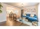 Open-concept living area with hardwood floors and modern furnishings, flowing into the kitchen at 1472 North Nw Ave, Atlanta, GA 30318