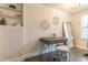 Bright office space featuring a modern desk, geometric wall art, and a stylish shelving unit at 1472 North Nw Ave, Atlanta, GA 30318