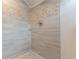 Close-up of tiled shower featuring modern fixtures and decorative tile accents, creating a spa-like experience at 1472 North Nw Ave, Atlanta, GA 30318