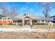 Charming single-story home featuring a welcoming front porch and well-manicured landscaping at 1724 Hill Ne St, Conyers, GA 30012