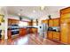Well-equipped kitchen with stainless steel appliances, stylish cabinetry, and granite countertops at 1724 Hill Ne St, Conyers, GA 30012