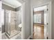 Bright bathroom featuring glass shower with neutral tile and stylish vanity at 1363 Summer Lane Se Dr, Atlanta, GA 30316
