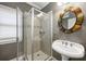 Bathroom featuring glass shower with neutral tile and stylish vessel sink at 1363 Summer Lane Se Dr, Atlanta, GA 30316