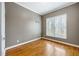 Bedroom featuring hardwood floors, gray walls, and bright natural light at 1363 Summer Lane Se Dr, Atlanta, GA 30316