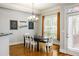 Elegant dining room with stylish chandelier and view to the backyard at 1363 Summer Lane Se Dr, Atlanta, GA 30316