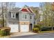 Charming two-story home with a two car garage and attractive architectural details at 1363 Summer Lane Se Dr, Atlanta, GA 30316