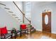 Inviting foyer boasts hardwood floors, staircase, and a stained-glass window in the front door at 1363 Summer Lane Se Dr, Atlanta, GA 30316
