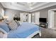 Spacious main bedroom features carpeted floors, tray ceiling, and doors leading to other rooms at 1363 Summer Lane Se Dr, Atlanta, GA 30316