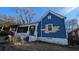 Exterior view of a two-story home with a screened-in porch and blue siding at 884 Mcdaniel Sw St, Atlanta, GA 30310