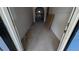 Unfinished hallway with doorway leading to another space with natural light at 884 Mcdaniel Sw St, Atlanta, GA 30310