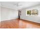 Inviting bedroom with hardwood floors and a large window offering natural light at 2412 Peachwood Circle Northeast Ne Cir # 3, Atlanta, GA 30345