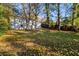 Enjoy the outdoors in this home's large backyard surrounded by mature shade trees at 2485 Brentwood Rd, Decatur, GA 30032