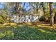 Enjoy the outdoors in this home's backyard surrounded by mature shade trees at 2485 Brentwood Rd, Decatur, GA 30032