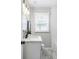 This bathroom includes a marble topped vanity and a white subway tiled shower/tub at 2485 Brentwood Rd, Decatur, GA 30032