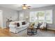Cozy living room with neutral walls, stylish furniture, bright natural light, and modern decor at 2485 Brentwood Rd, Decatur, GA 30032