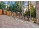 Gated backyard space surrounded by mature trees and lush landscaping at 3235 Roswell Ne Rd # 919, Atlanta, GA 30305