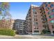 Charming brick building with multiple floors, balconies, and classic architectural details at 3235 Roswell Ne Rd # 919, Atlanta, GA 30305