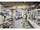 A fully-equipped gym featuring treadmills and weights with floor-to-ceiling mirrors for your fitness routine at 3235 Roswell Ne Rd # 919, Atlanta, GA 30305