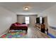 Bedroom with wood flooring and ceiling light at 312 Jodeco Station E Cir, Stockbridge, GA 30281