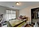 Bedroom with light walls, a window, and a closet at 312 Jodeco Station E Cir, Stockbridge, GA 30281