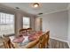 Bright dining room with seating for six, with natural light at 312 Jodeco Station E Cir, Stockbridge, GA 30281