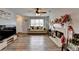 Cozy living room features a fireplace and hardwood floors at 312 Jodeco Station E Cir, Stockbridge, GA 30281