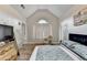 Main bedroom with vaulted ceiling, wood-look flooring and neutral decor at 312 Jodeco Station E Cir, Stockbridge, GA 30281