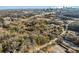 Expansive aerial view showcasing lush trees, with the city skyline in the background at 1255 North Nw Ave, Atlanta, GA 30318