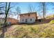 View of the backyard with a grassy area and mature trees at 1255 North Nw Ave, Atlanta, GA 30318