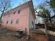 Side exterior view of a residence with a backyard and privacy fence at 1255 North Nw Ave, Atlanta, GA 30318