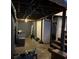 Unfinished basement with stairs and side door to the exterior at 1255 North Nw Ave, Atlanta, GA 30318