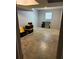 View of unfinished basement with concrete floors, white walls, and window for natural light at 1255 North Nw Ave, Atlanta, GA 30318