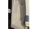 A white jacuzzi bathtub with black tiles, a gray towel, and soap dish at 1255 North Nw Ave, Atlanta, GA 30318