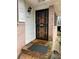 Classic home entrance featuring a decorative security door and a welcoming exterior light fixture at 1255 North Nw Ave, Atlanta, GA 30318