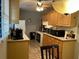Spacious kitchen with ample countertop space, wooden cabinets, and modern appliances, ready for everyday use at 1255 North Nw Ave, Atlanta, GA 30318