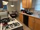 Bright kitchen with a gas range and ample counter space, perfect for cooking and entertaining at 1255 North Nw Ave, Atlanta, GA 30318