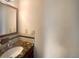 Bathroom featuring updated vanity and mirror at 4893 Hairston Pl, Stone Mountain, GA 30088