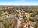 Picturesque aerial view of the golf course showcasing the scenic layout and a pond with fountain at 2261 Venetian Dr, Atlanta, GA 30311
