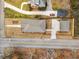 Aerial view of a home with a long driveway and detached garage at 2261 Venetian Dr, Atlanta, GA 30311