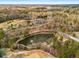 High up, the neighborhood park features a scenic pond, baseball field, and winding roads at 2261 Venetian Dr, Atlanta, GA 30311