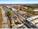 Expansive aerial view of a bustling commercial area with ample parking, showcasing the community's connectivity and convenience at 2261 Venetian Dr, Atlanta, GA 30311