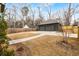 Large backyard with a two-car detached garage and plenty of green space at 2261 Venetian Dr, Atlanta, GA 30311