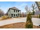 Charming two-story home with a long driveway and well-manicured landscaping at 2261 Venetian Dr, Atlanta, GA 30311