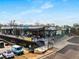 A vibrant Food Hall featuring West End Gusto Coffee, welcoming customers with outdoor seating and a modern design at 2261 Venetian Dr, Atlanta, GA 30311